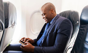 man on plane with mobile device, Xerox, Connect Key, Vary Technologies, NH, ME, MA, Xerox, Lexmark, HP, Toshiba, Copier, MFP, Printer, Service, Sales, Supplies
